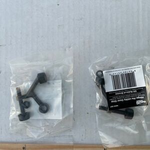 National Hardware case of 40 oiled bronze hinge pin door stop